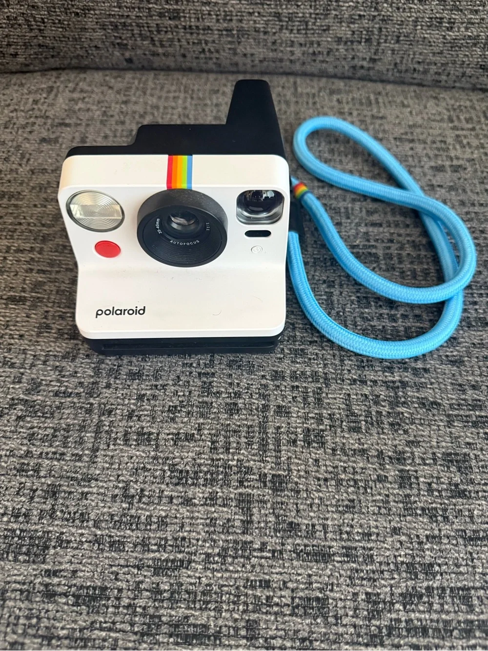 Polaroid White Instant Camera with Black Base and Red Shutter